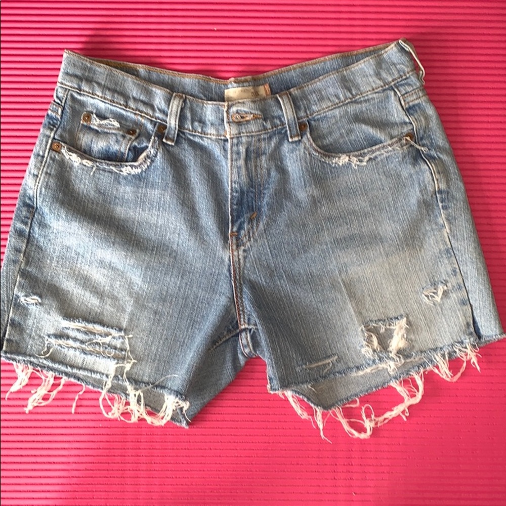 Levi’s distressed light washed denim shorts